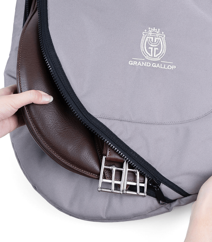 Close-up of Grand Gallop Saddle Carrier Backpack zipper showcasing heavy-duty design and stylish logo.